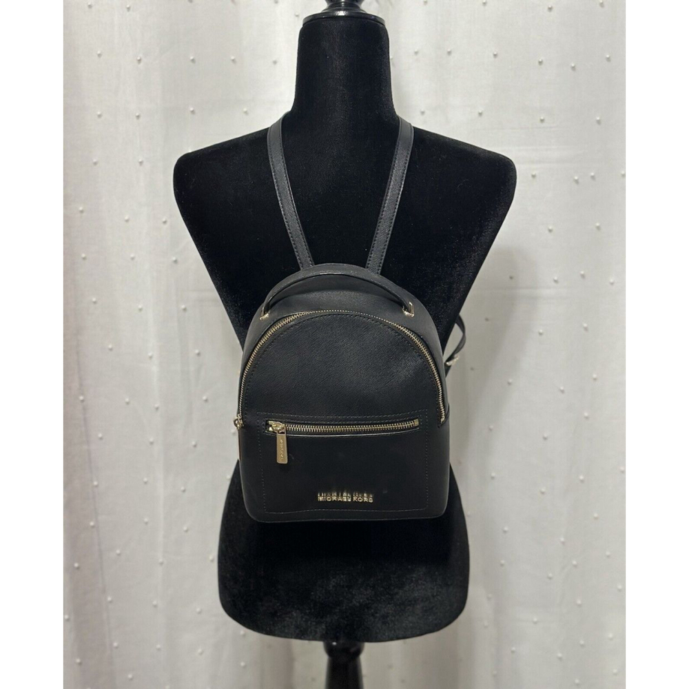 Michael Kors backpack purse Black With Gold Accents.